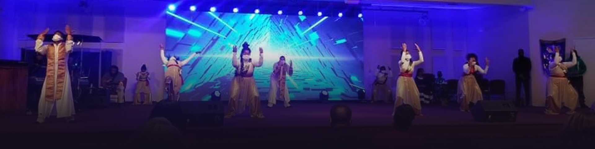 Praise dance team on stage praise dancing